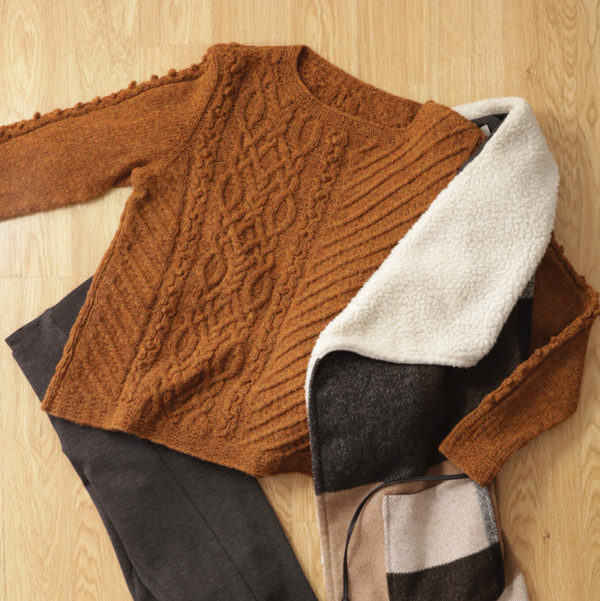 Rustic wool and cables go together perfectly in the nearly seamless Pinyon Pullover.