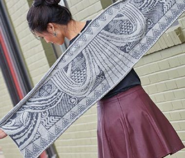 The D’Amour Wrap knit shawl is an example of gorgeous color knitting.