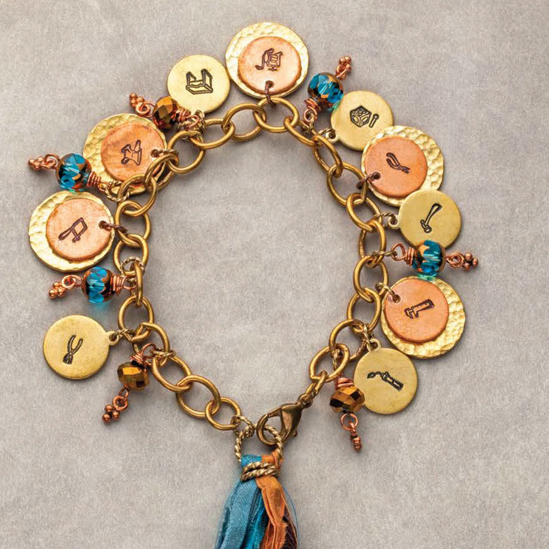 stamped metal jewelry: Rita Pannulla Charming Jewelry Tools Bracelet Brass, copper, Czech glass, silk PHOTO: JIM LAWSON