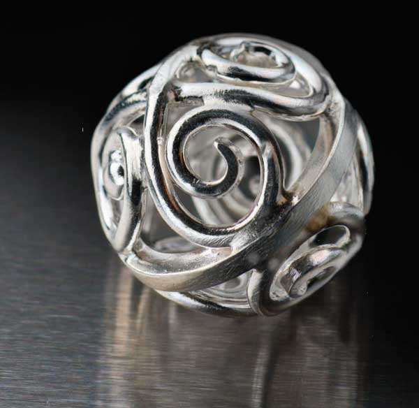 Silver Filigree Bead by Nanz Aalund with José Lins would be the perfect jewelry design to turn into a holiday ornament.